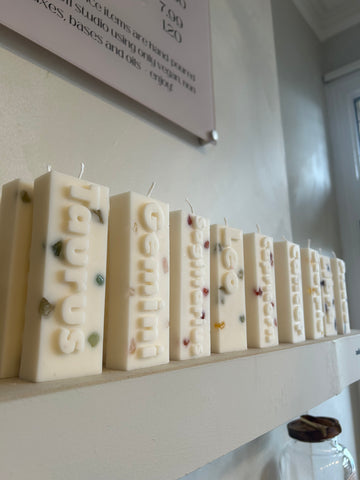 Crystal infused zodiac candles